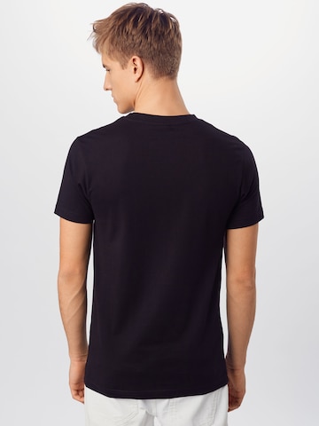 MT Men قميص بلون أسود: الخلف