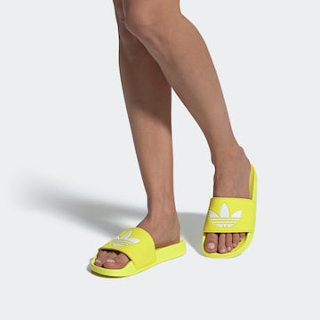 ADIDAS ORIGINALSNatikače s potpeticom 'Adilette' - žuta boja: prednji dio