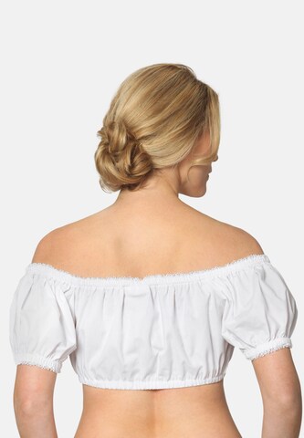 STOCKERPOINT - Blusa tradicional en blanco