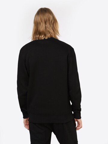 ALPHA INDUSTRIES - Sudadera en negro: atrás