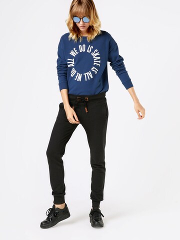 naketano Tapered Trousers 'Deine Muttaaa' in Black