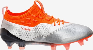 PUMA Sportschoen 'One 1 Lth FG/AG' in Oranje