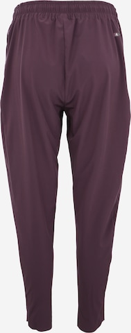 ODLO Slim fit Workout Pants in Purple: back