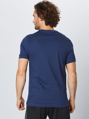 Coupe regular T-Shirt 'Club' Nike Sportswear en bleu