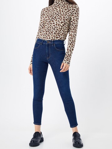 Skinny Jeans 'High Rise' de la WRANGLER pe albastru: față