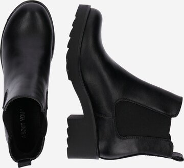 ABOUT YOU - Botas Chelsea en negro: lado