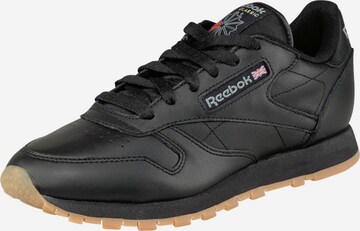 Reebok Sneakers in Black: front