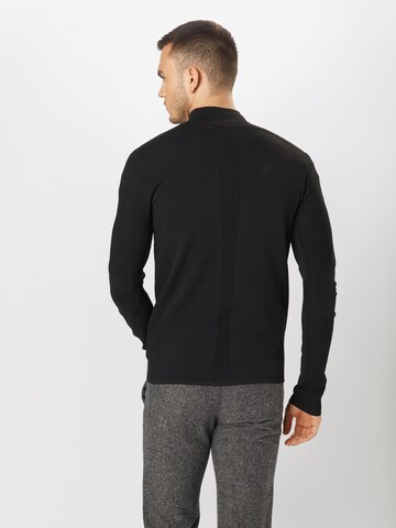 DRYKORN Regular fit Pletena jopa 'Braxten' | črna barva