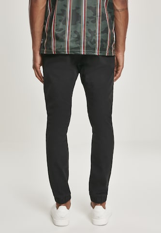 Tapered Pantaloni di SOUTHPOLE in nero