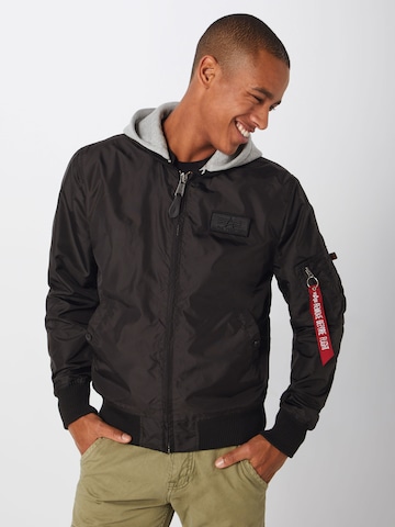 ALPHA INDUSTRIES - Chaqueta de entretiempo en negro: frente