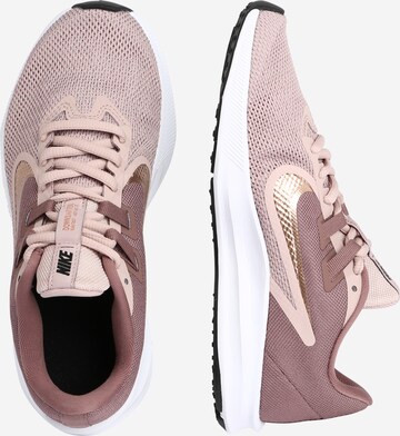 Chaussure de course 'DOWNSHIFTER 9' NIKE en rose