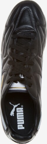 Chaussure de foot 'King' PUMA en noir