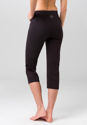 LASCANA ACTIVE Skinny Παντελόνι φόρμας σε μαύρο