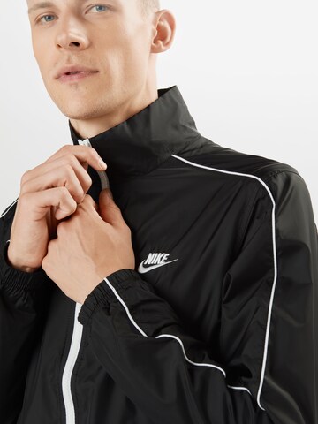 Nike Sportswear Облекло за трениране в черно