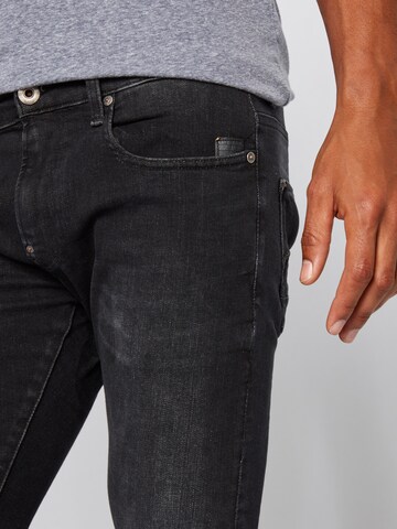 Slimfit Jeans 'Revend' de la G-Star RAW pe negru