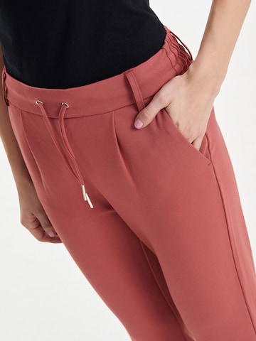 ONLY Slimfit Broek 'Poptrash' in Oranje