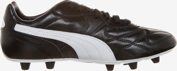 Chaussure de foot 'King' PUMA en noir