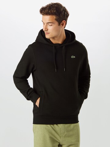 LACOSTE Sweatshirt i sort: forside