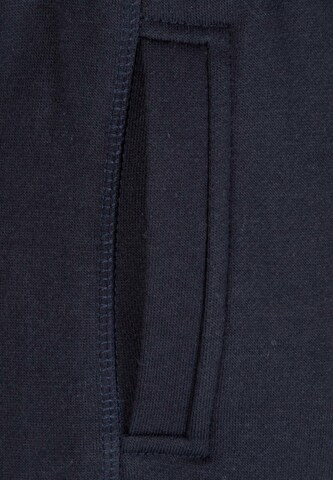 Urban Classics Конический (Tapered) Штаны в Синий