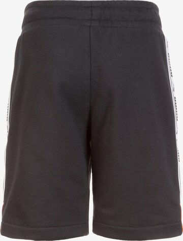 PUMA Regular Shorts 'XTG' in Schwarz