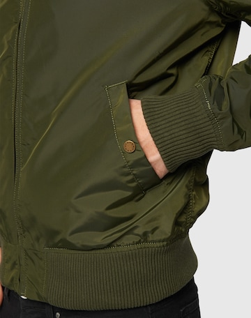 ALPHA INDUSTRIES - Chaqueta de entretiempo 'MA-1 TT' en verde