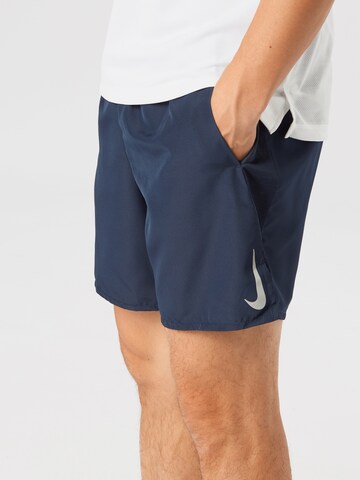NIKE Regularen Športne hlače 'Challenger 7' | modra barva