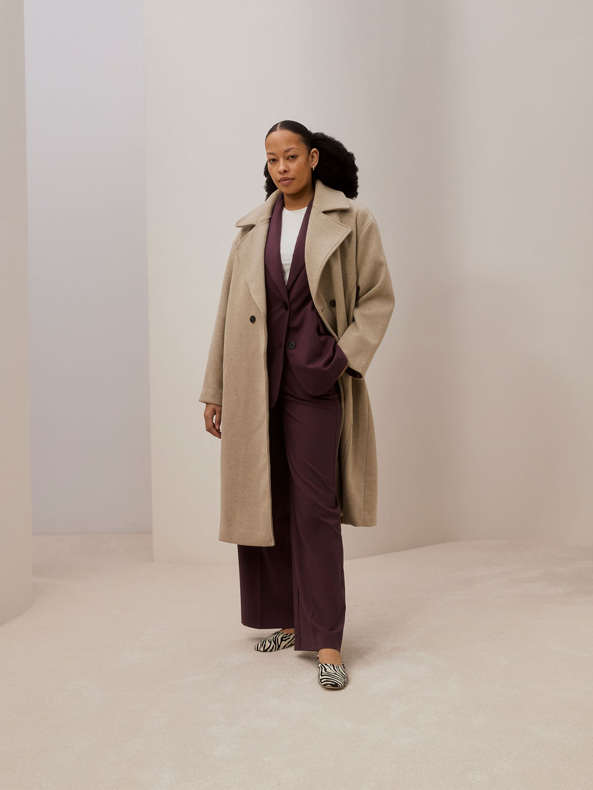 Olivia C. - Burgundy Suit With Coat Look