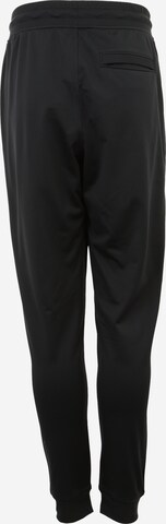 UNDER ARMOUR Tapered Sportsbukser i sort