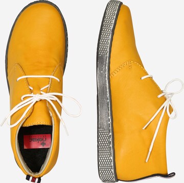 Rieker Обувки с връзки в жълто