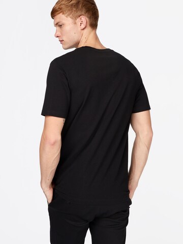 Tricou de la WOOD WOOD pe negru: spate