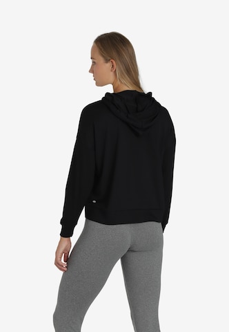 ENDURANCE ATHLECIA Sportief sweatshirt 'Singo' in Zwart