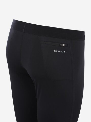 NIKE Skinny Sporthose in Schwarz