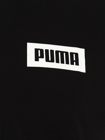 PUMA Sportshirt 'Rebel' in Schwarz