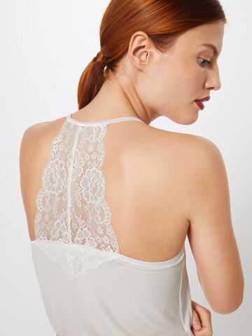 CULTURE Top 'Millo' in White
