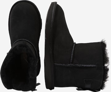 UGG حذاء للثلج 'Mini Bailey Bow II' بلون أسود