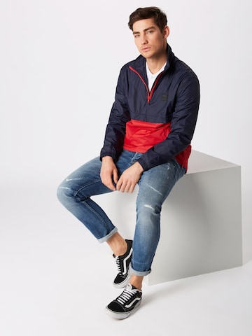 Coupe regular Veste mi-saison Urban Classics en bleu