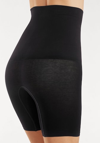 PETITE FLEUR Muotoilevat housut värissä musta