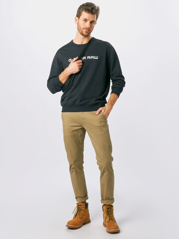 Dockers Slimfit Chino kalhoty 'ALPHA ORIGINAL' – hnědá