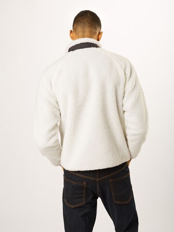 Carhartt WIP Regular fit Prehodna jakna 'Prentis Liner' | bela barva: zadnja stran