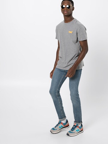 Superdry Koszulka 'ORANGE LABEL VNTGE EMB TEE' w kolorze szary