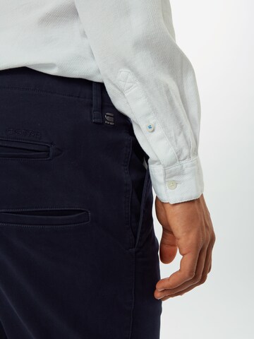 G-STAR Slimfit Chino kalhoty 'Vetar slim' – modrá