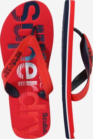 Flip-flops de la Superdry pe roșu