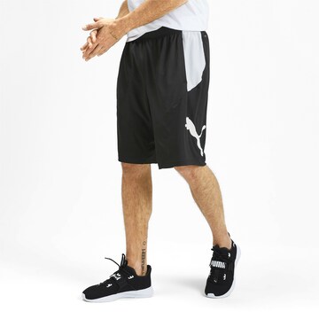 PUMA Regular Sports trousers in Black: front