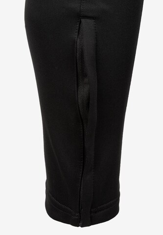 Effilé Pantalon de sport UMBRO en noir