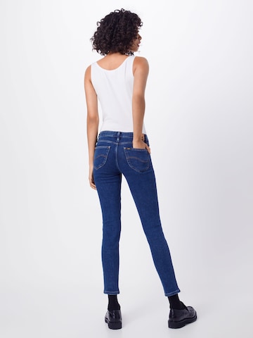 Skinny Jean 'Scarlett' Lee en bleu : derrière