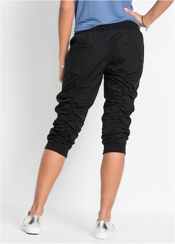 bonprix Tapered Hose in Schwarz