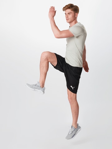 PUMA Loosefit Sportshorts 'Liga' in Schwarz