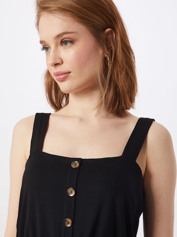 Tuta jumpsuit 'Cassia' di ABOUT YOU in nero