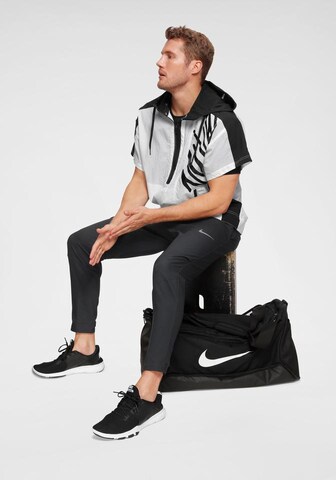 NIKE Slimfit Sportbroek in Zwart