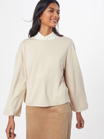 Sweat-shirt 'Genia' ABOUT YOU en beige : devant